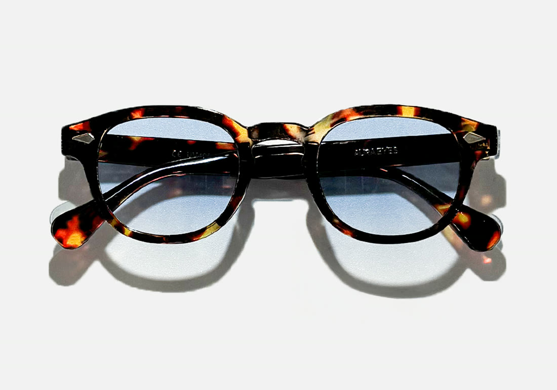Retro Blue Elegance — tortoise frame, pale blue lens